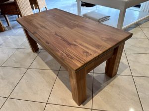 Coffee table in solid wood paneling with unique sliding top. Woodesignz.nz