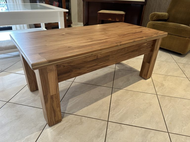 Coffee table in solid wood paneling with unique sliding top. Woodesignz.nz