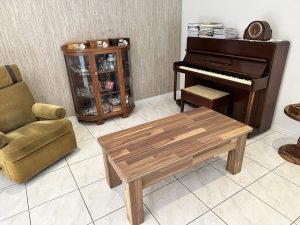Coffee table in solid wood paneling with unique sliding top. Woodesignz.nz