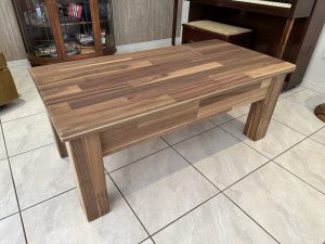 Coffee table in solid wood paneling with unique sliding top. Woodesignz.nz