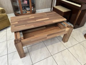 Coffee table in solid wood paneling with unique sliding top. Woodesignz.nz